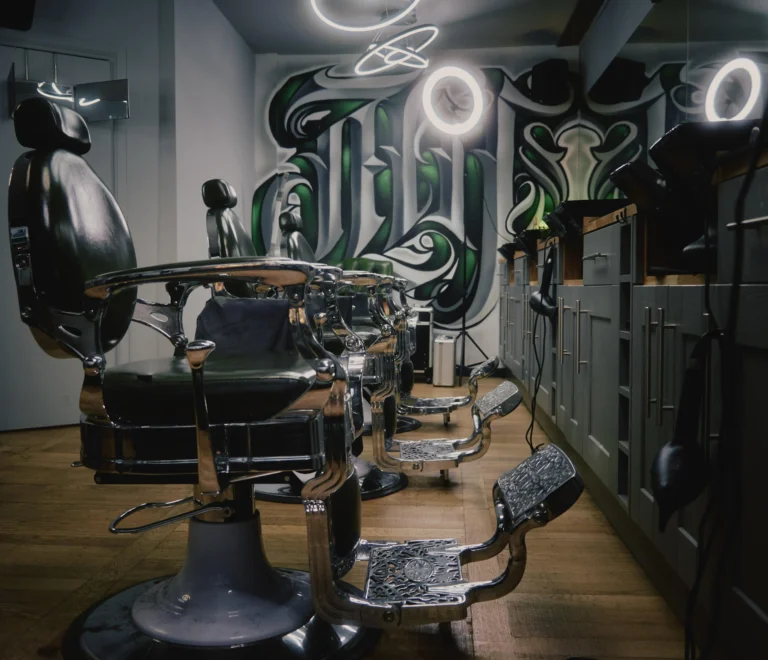 Barber chairs in a row at Jimmy Marum's Barbershop Twickenham.
