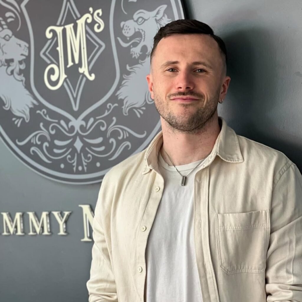 Joe, barber at Jimmy Marum's.