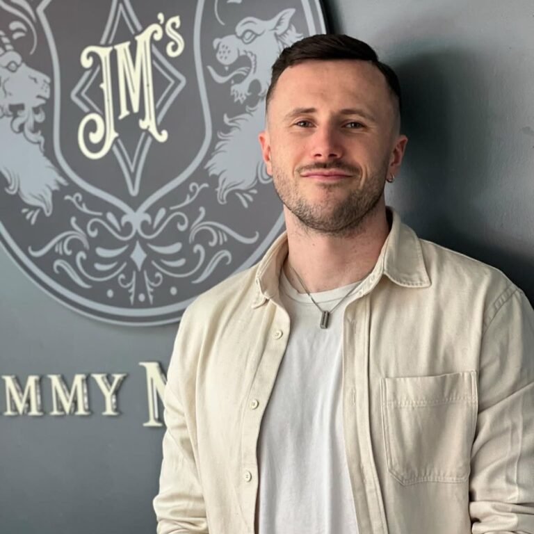 Joe, barber at Jimmy Marum's.